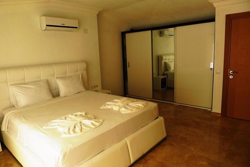 Furnished Luxury Sea View Villa for Sale in Kalkan – master bedroom (image 16)