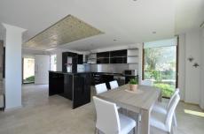 Dining area with architectural spacing supporting natural ventilation