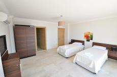 Interior area demonstrating natural climate control through architectural spacing