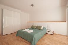 Interior area demonstrating light dynamics through window positioning