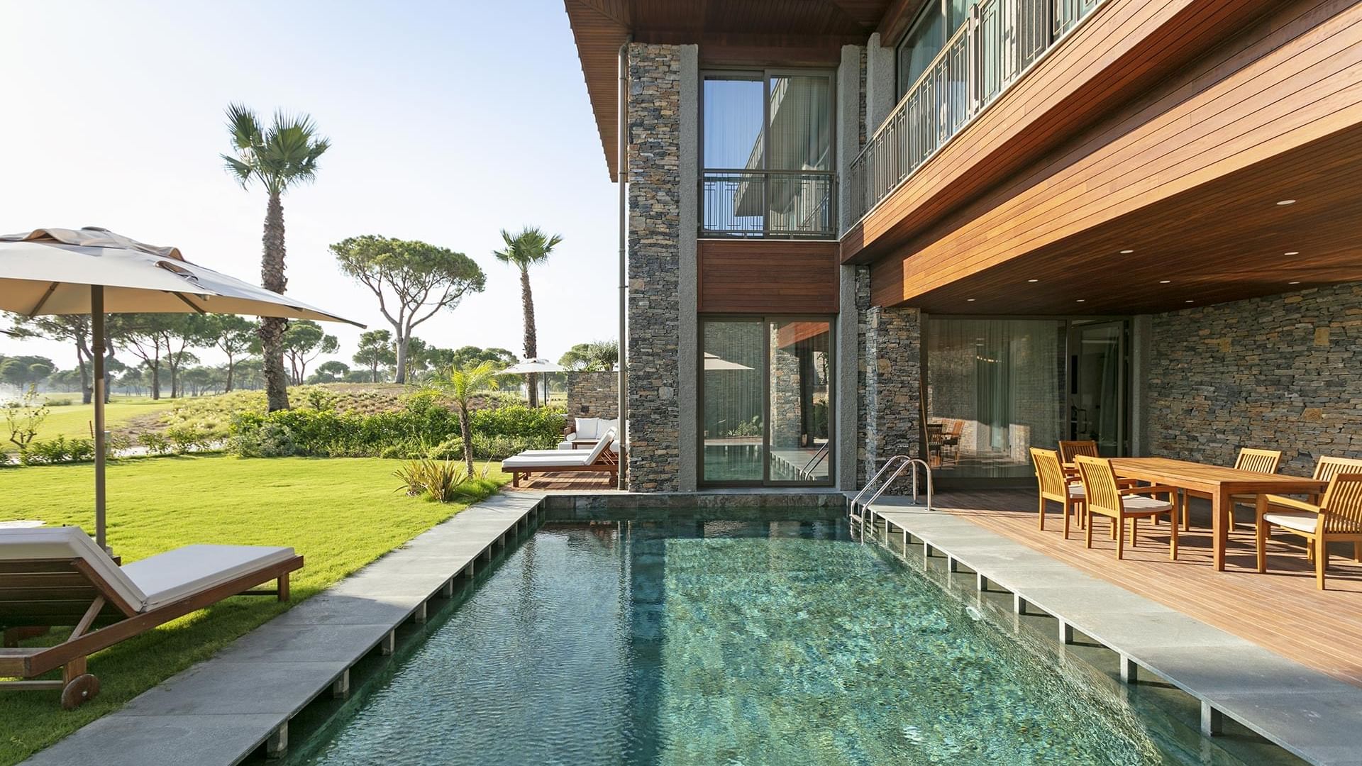 Villas for sale in Belek, Turkey with private pools, landscaped gardens, and exclusive resort positioning