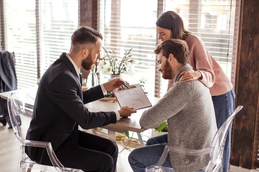 international buyers discussing property purchase with real estate consultant in Turkey